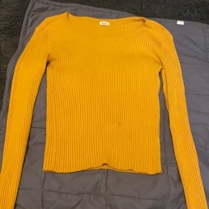 Stretchy, soft and comfy mustard coloured sweater